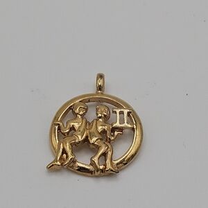 gold tone Gemini twins pendant